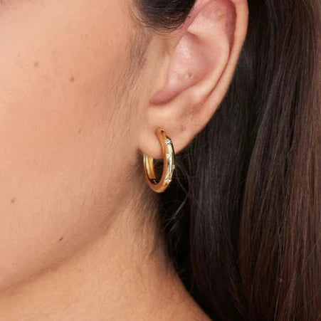 Gold Scattered Stars Hoop Earrings by Ania Haie